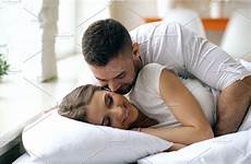 bed couple kiss morning loving wife hug man wake beautiful his young attractive men people share