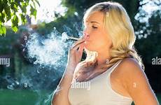 smoking pregnant woman cigarette alamy