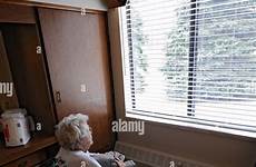 nursing woman old lonely window lady stock elderly looking female alamy