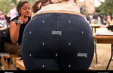bending over woman overweight wandsworth alamy london shopping