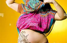 pregnant indian belly woman henna sari alamy hands painted happy