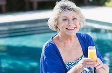 bathing women suits older stock woman senior pool sitting signature
