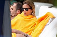 caroline flack towel miami tan avoid lines off her top slips covering she sure sun too much make get didn