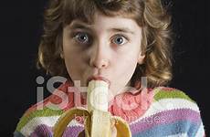 banana eating girl stock getty premium freeimages istock