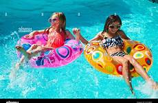 pool girls swimming rings stock inflatable alamy