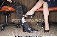 woman footsie playing footsies romantic choose board under table