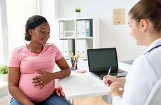 doctor women care pregnant woman hospital childbirth greater risk during color