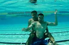 underwater swimming men