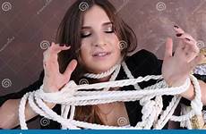 tied girl rope hands holding white stock female