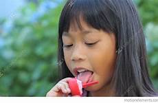 popsicle girl asian close stock enjoys smiling footage similar