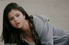 selena she inadvertently tuck packed performs brent becomes roll action film scene katching sidekick