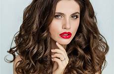 brunette glamorous curly hair beautiful portrait lipstick bright makeup close red stock sensual gorgeous two beauty