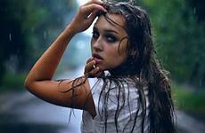 wet rain women hair open long model eyes blue drops outdoors mouth brunette trees hands head water