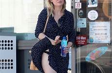 dunst kirsten dress windy undies upskirt day blows her breeze gas station blowing angeles los short la wind underwear unaware