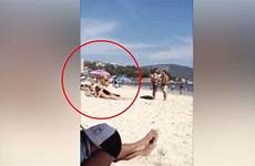 sunbathing girl beachgoer huge man gets shock bikini express next woman when viral life shocked
