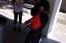 mother child dragging son beats belt school her face confirmed they threatens his seen him protective investigating pictured incident district
