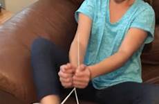 legs ties child her knees next against online bend lift move floor off