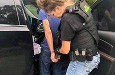 police handcuffed female cop women escorted world officers