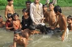 pakistan children swim npr clash religion birth control canals rural their