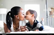 son kissing mother alamy stock