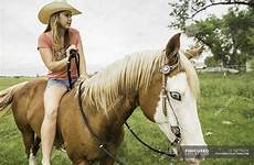 horse riding woman bareback young ranch montana field stock country blond hair