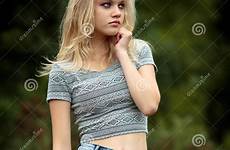 woods girl alone teenage bautiful young blond stock jeans