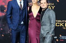 mockingjay part hunger games premiere berlin lawrence jennifer cleavage bares also josh hutcherson