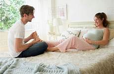 woman man pregnant massaging feet dissolve stock tetra d1028