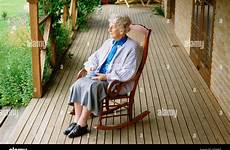 rocking chair old woman sitting veranda stock porch alamy front relaxing her nude girl looking naked temporarly zainab irish mature