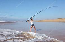 fishing casting rod beach lady stock top st surf croix depositphotos