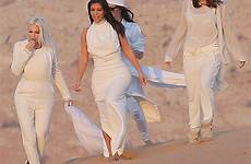 kim desert kardashian dubai white her stuck through driving they mercedes wear sight dramatic wore beauty team while sand she