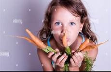 eating girl carrots alamy fresh child sweet young