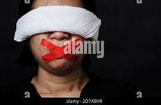 adhesive blindfold wrapping slave chains