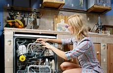 blonde kitchen cupboards girl cupboard indoor alamy flat woman young