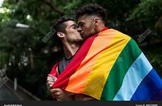 gay kissing couple flag rainbow