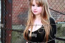 tied girl blonde teenage wire bondage woman barbed fake alamy stock