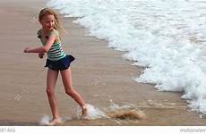 beach young playing girl sea waves stock video people footage children