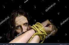 kidnapped tied rope woman abused victim locked stress hostage emotional missing hands search shutterstock stock