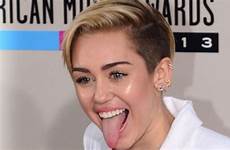 cyrus miley tongue raunchy antics bangerz criticised parents tour health volumes speaks hygiene invited turns offer down twitter penis afp