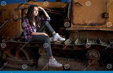 girl tractor sitting teen beautiful old tracks preview