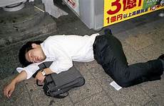 sleeping japanese businessmen streets drunk japan work photographer public tokyo culture business strict testament metro he snoozing phenomenon documents common