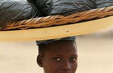 benin togo africa choose board border along culture people girl faces west