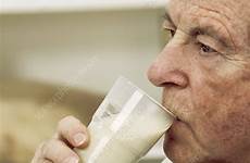 drinking milk man elderly stock