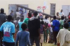 zambia police riots murders ritual arrest sparked suspects four pole doorway batter during use people shop