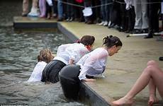 water swimmers cold year dressed schoolgirls sea after swims group themselves british warm freezing