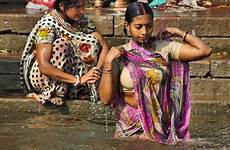 bathing woman bath prayers ghats submerging