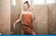 shower girl sexy young bathroom woman tile takes brown wrapped attractive beautiful background