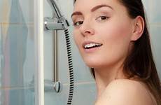 showering woman douchecabine meisje douchen cubicle vrouw cel overgieten hygiene stockafbeelding royalty