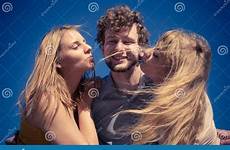 girls boy kissing having outdoor fun two women preview