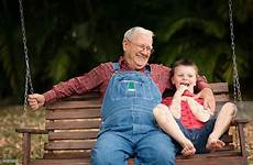 grandpa sitting little grandfather his swing conversation he billy appears bench thought deep when